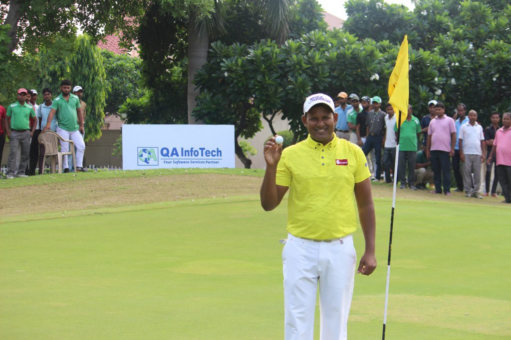 N Thangaraja posing after an ace