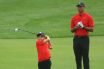 Tiger Woods and Charlie Woods in Sunday red at the PNC Championship