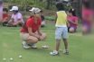 Nitika Jadeja with a junior golfer