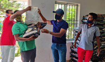 Chikkarangappa S. (Centre) providing help to Eagleton caddies