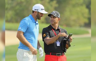 Dustin Johnson with Claude Harmon III | Photo: Golf Digest