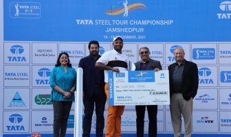 Udayan Mane receives the winner's cheque and trophy from Mr. T V Narendran, CEO & Managing Director, TATA Steel. The other dignitaries in the picture are Mr. Sanjiv Paul, Vice President (Safety, Health & Sustainability), TATA Steel (extreme right), Mrs. Ruchi Narendran (extreme left) and Mr. Uttam Singh Mundy, CEO, PGTI (2nd from left).
