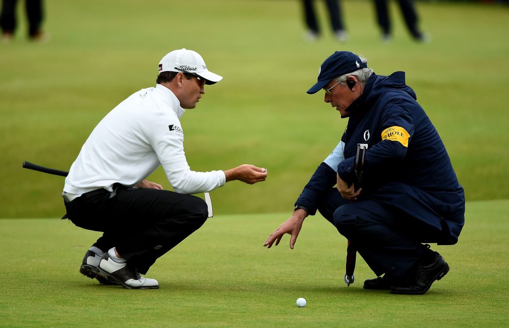 Referee explaining rule to a player