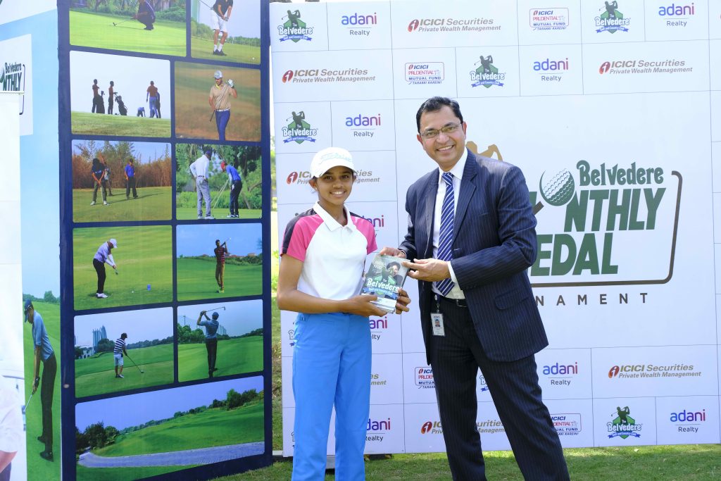Tvisha Patel (Lady winner) with Ajay Upadhyay of ICIC Securities Private Wealth Management