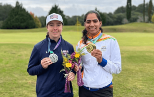 Diksha Dagar poses with her gold medal with finalist Ashlyn Johnson