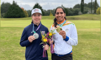 Diksha Dagar poses with her gold medal with finalist Ashlyn Johnson