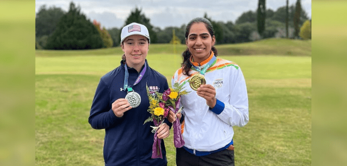 Diksha Dagar poses with her gold medal with finalist Ashlyn Johnson 