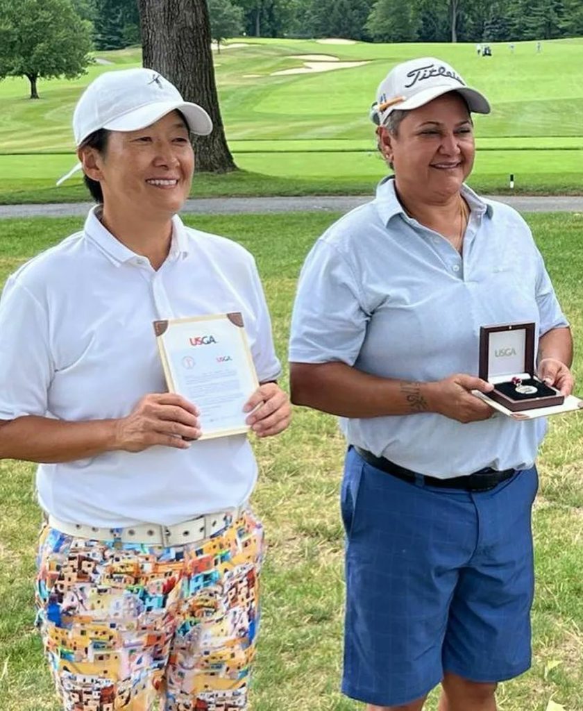 Yuko Ogura and Smriti Mehra pose after finishing joint winners of the qualifier in Pennsylvania