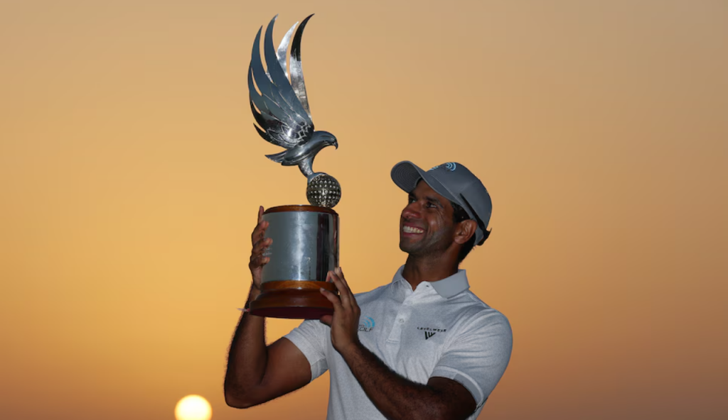 Aaron Rai poses after outduelling Mcilroy & Fleetwood