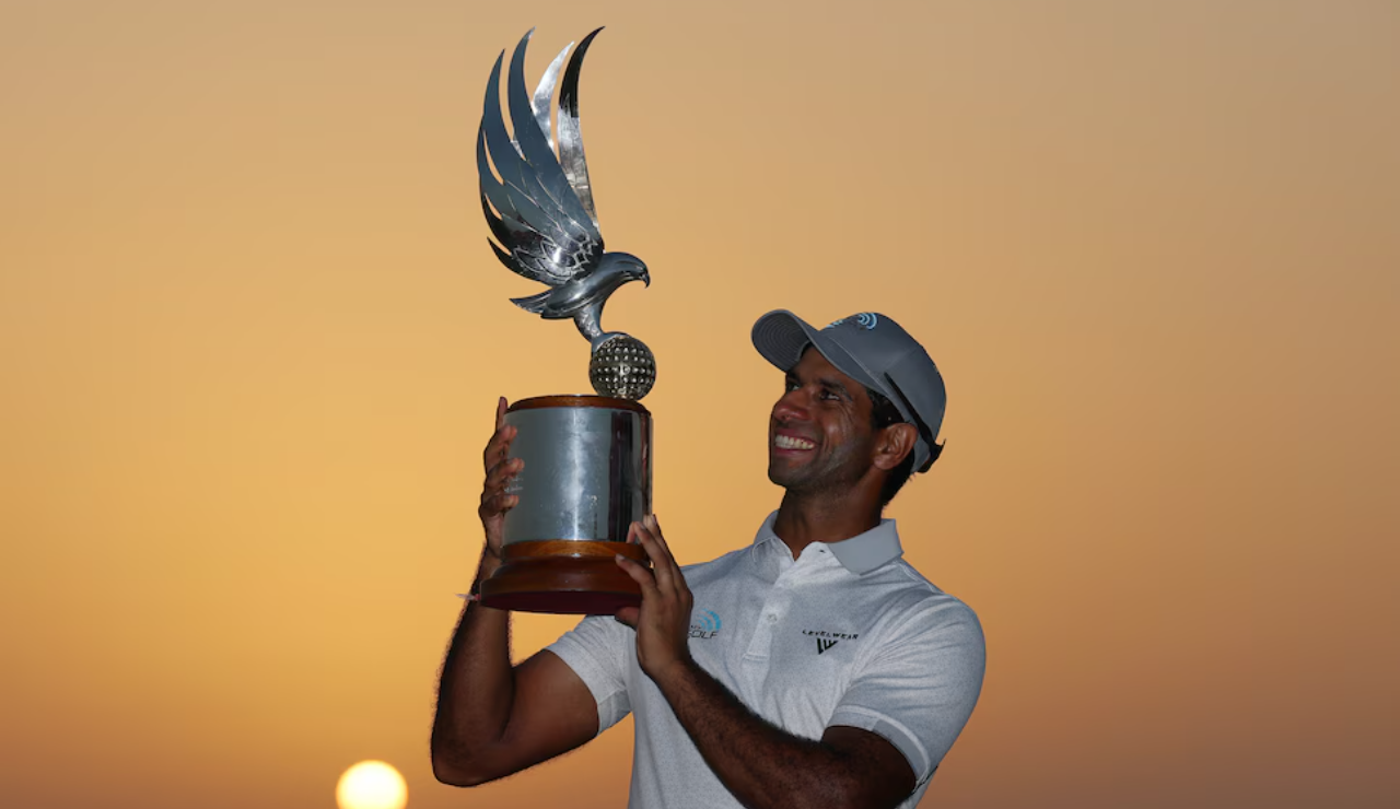 Aaron Rai poses after outduelling Mcilroy & Fleetwood
